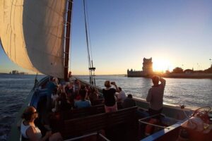 2-Hour Lisbon Traditional Boats Sunset Cruise with White Wine - A Traditional Boat Feel With Wine Flowing During Golden Hour