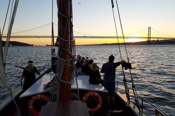 2-Hour Lisbon Traditional Boats Sunset Cruise with White Wine - Under the 25 de Abril Bridge: The Moment the City Feels Bigger