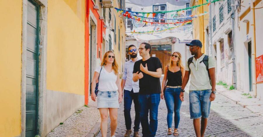 Best of Lisbon Walking Tour: Rossio, Chiado & Alfama - Restauradores Square and the independence obelisk: history you can point to