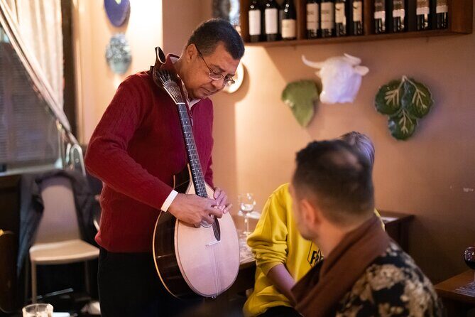 Fado Musical Experience with Portuguese Wine & Appetizers - What the guide actually does for your experience
