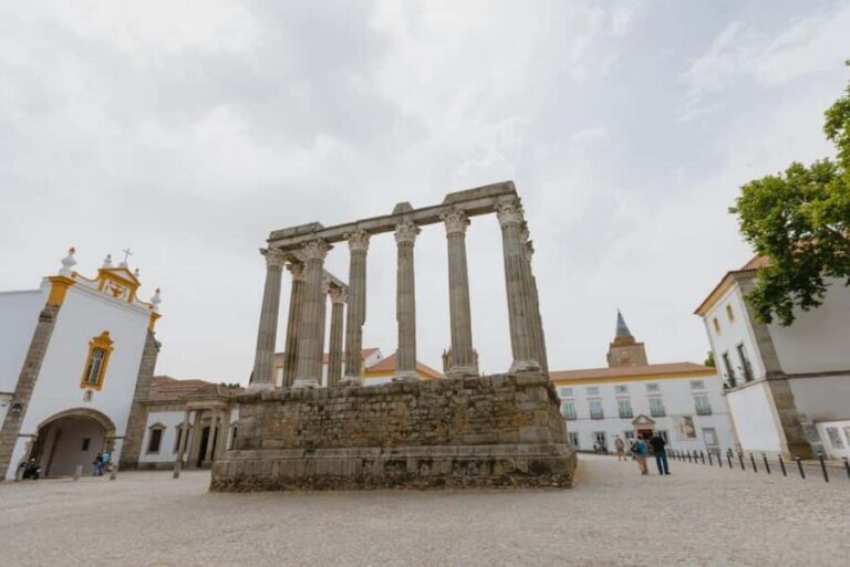 From Lisbon: Évora and Monsaraz Day Tour with Wine Tasting - Entering Évora’s Old City: Roman Temple, St. Francis, and Praça do Giraldo