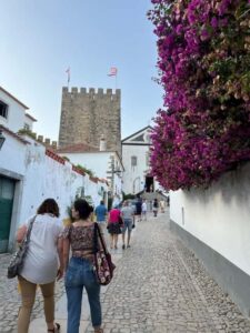 From Lisbon: Fátima, Batalha, Nazaré and Óbidos Day Tour - Óbidos Castle walls and ginja moments