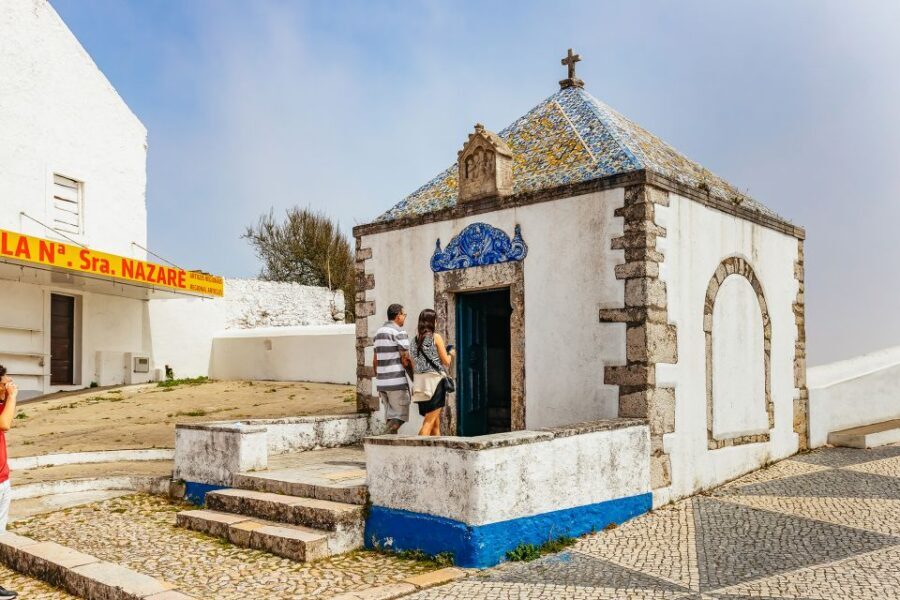 From Lisbon: Fatima Batalha Nazaré & Óbidos Small-Group Tour - Nazaré cliffs and the Atlantic: lighthouse panoramas and seaside time