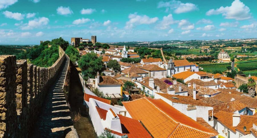 From Lisbon: Nazare Big Waves and Óbidos Guide Day Trip - Nazaré: Lighthouse Views, the Sítio Area, and Wave-Watching
