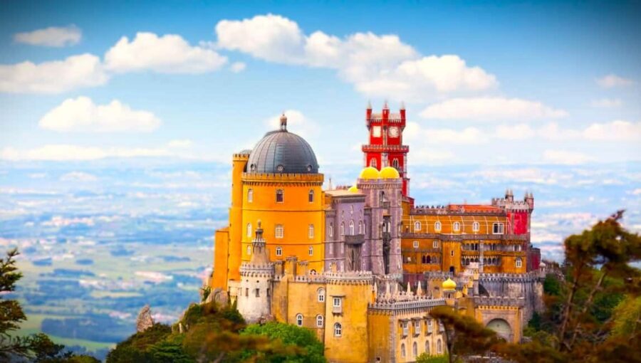 From Lisbon: Pena Palace, Regaleira, Sintra & Cascais Tour - Quinta da Regaleira: Moorish-style gardens and walkable viewpoints