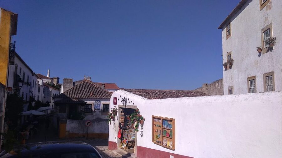 From Lisbon: Private Óbidos and Nazaré Tour - Óbidos’ medieval streets, aqueduct clues, and castle-walk energy