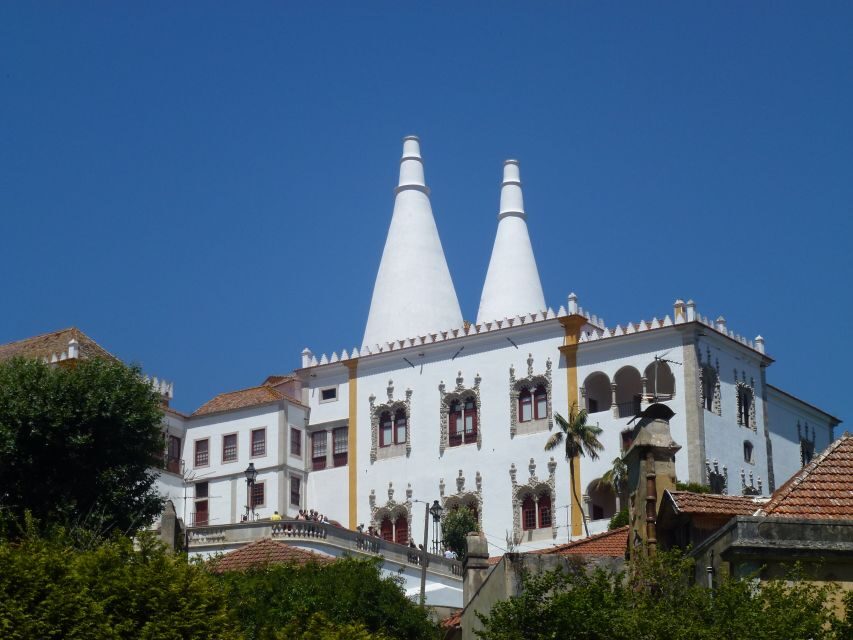 From Lisbon: Sintra Pena Palace Cascais 8-People Group Tour - Pena Palace: The Main Show on Sintra Mountain