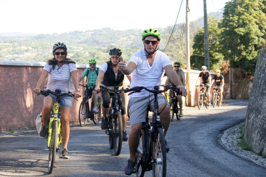 From Lisbon: Sintra to Cascais Full-Day Guided E-Bike Tour - Vineyards, village viewpoints, and the climb toward Peninha