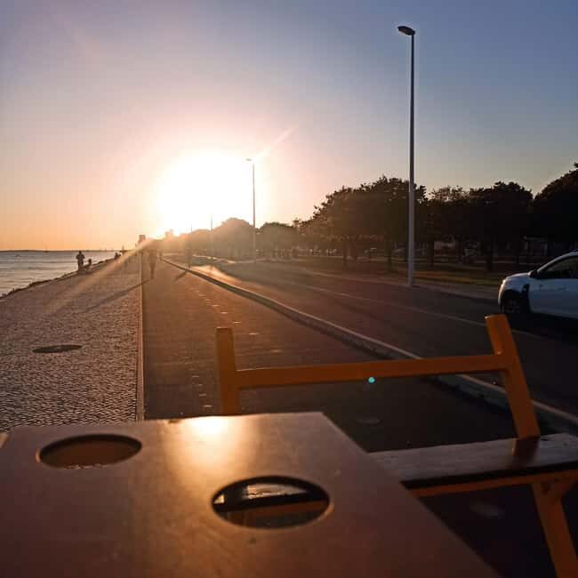 Lisbon: 1-Hour Beer or Sangria Bike Sightseeing Tour - 25 de Abril Bridge: The Big Photo Moment and a Drink Reset