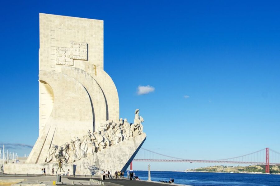 Lisbon: 1-or 2-Day Hop-On Hop-Off Bus Tour - On-board experience: audio guide, open top deck, and real-world tips
