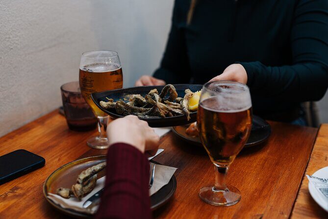 Lisbon: Award-Winning Guided Walking Food Tour with Local Drinks - Stop-by-Stop: Petiscos, Sardines, Bifana, and Pastel de Nata