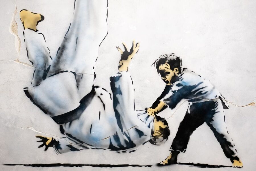 Lisbon: Banksy Museum Permanent Exhibition Entry Ticket - The famous hits: seeing Girl with Balloon and Sweep It Under the Carpet