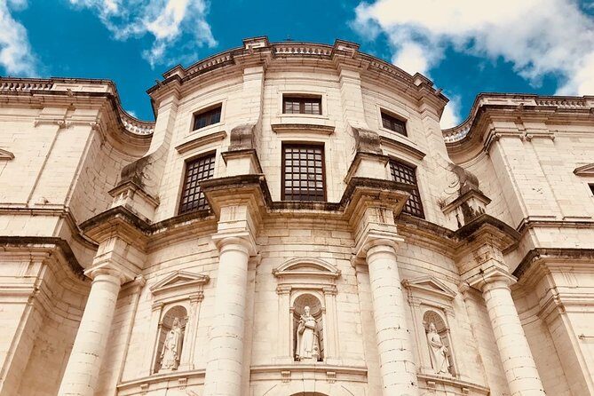 Lisbon: City Tour by Tuk Tuk - Alfama: narrow streets, colorful houses, and the oldest-quarter mood