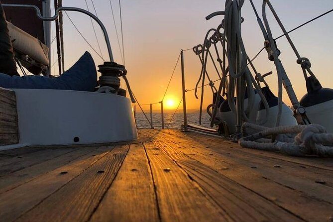 Lisbon: Daylight or Sunset on a Vintage Sailboat - Wine, petiscos, and the calm vibe on deck