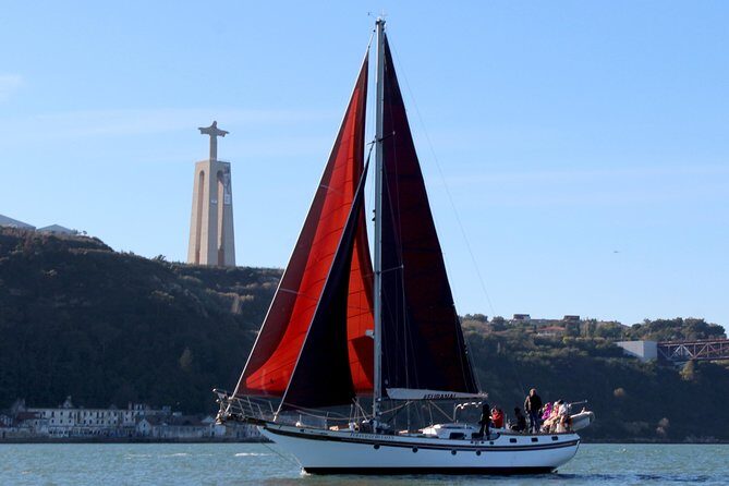 Lisbon: Daylight or Sunset on a Vintage Sailboat - What to wear: comfy shoes and a jacket for after sunset
