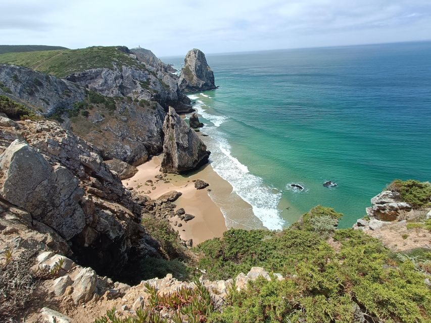 Lisbon: Pena, Regaleira & Atlantic Coast Tour with a Local - Quinta da Regaleira: initiation well, symbols, and secret-tunnel mythology