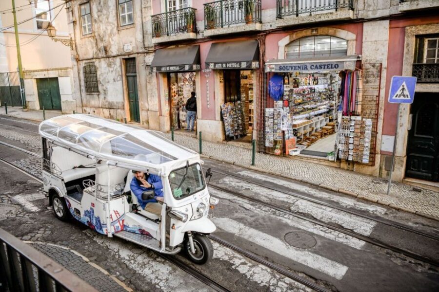 Lisbon: Private City Tour by Eco Tuk Tuk - Chiado and Bairro Alto: classic streets, steep turns, and real city energy