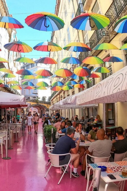 Lisbon: Private City Tour by Tuk-Tuk - Rua Cor-de-Rosa, Pink Street: a quick, fun counterpoint