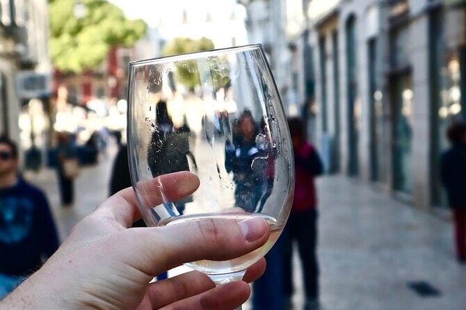Lisbon Private Food Tour – Taste 10+ Local Dishes & Wines - Santa Justa lift: a literal vertical shortcut with big route value