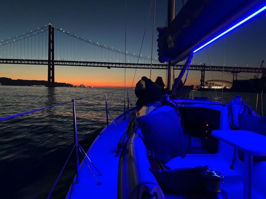 Lisbon: Sailboat Tour w/ Local Guide and Open Bar Green Wine - Almada, Alfama, and Commerce Square: seeing Lisbon’s layers from water