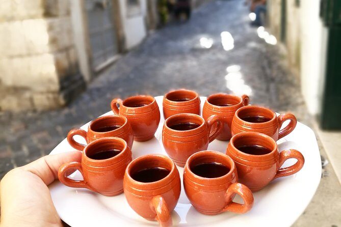 Lisbon Small-Group Food Tour with 18 Tastings in Alfama District - Miradouro de Santo Estevão: Alfama’s Calmer Side