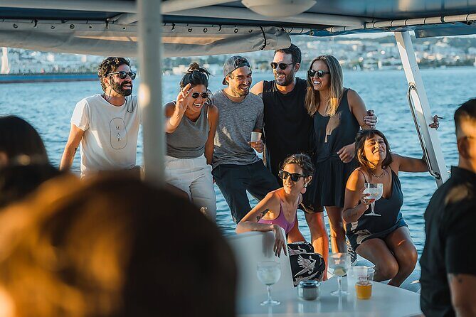 Lisbon: Sunset Catamaran Boat Tour with Music and Drinks - Nets vs. Covered Terrace: Pick Your Comfort Like a Pro