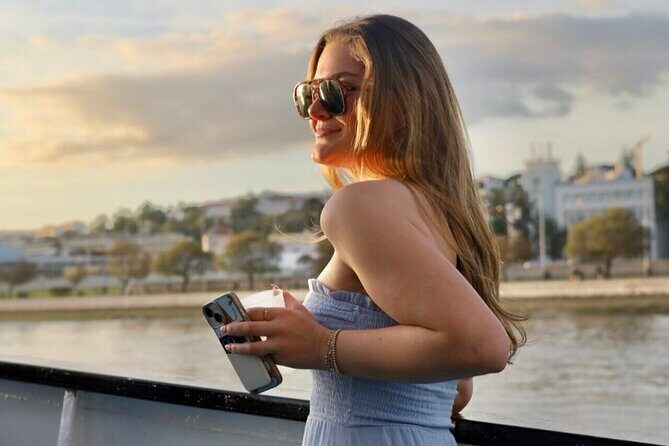 Lisbon: Sunset on board with music & drinks - The first magic minute: cruising toward Alfama and the old-riverfront vibe
