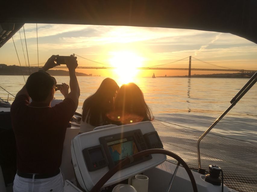 Lisbon: Sunset Sailing Boat Cruise with Wine - Commerce Square and the downtown river edge: where Lisbon feels open