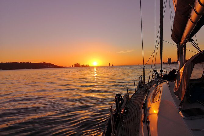 Lisbon Sunset Sailing Tour on Luxury Sailing Yacht with 2 Drinks - Drinks and Portuguese Snacks: How the Included Food Feels Onboard