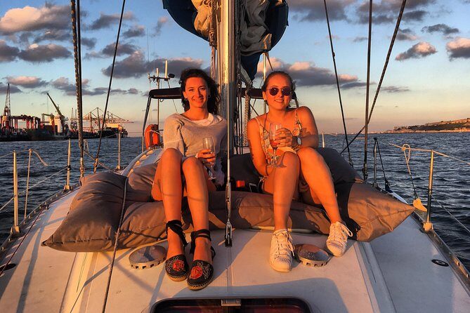 Lisbon Sunset Sailing Tour with White or Rosé Wine and Snacks - A royal palace and an art museum garden view