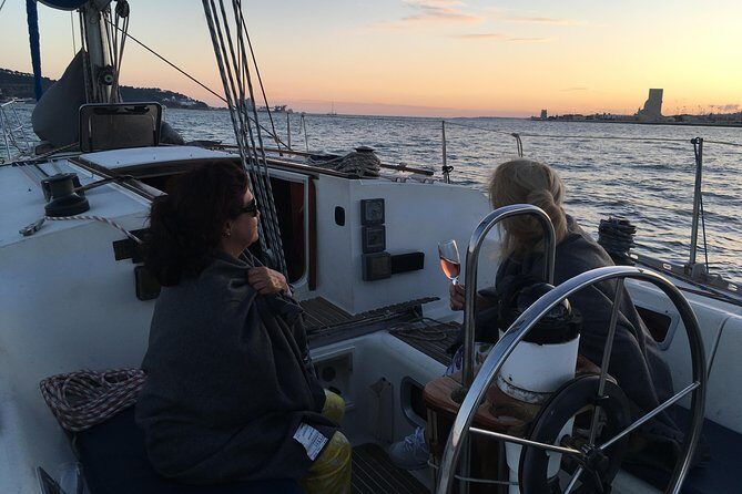 Lisbon Sunset Sailing Tour with White or Rosé Wine and Snacks - Wine, snacks, and food reality on board