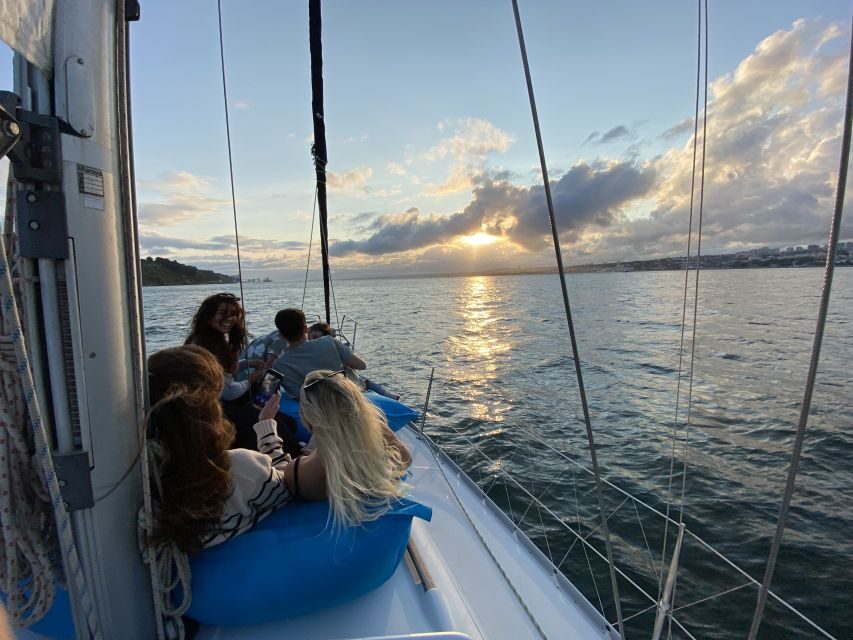 Lisbon: Tagus River Sunset Cruise with Drinks - Commerce Square and Alfama: the city’s river-facing story