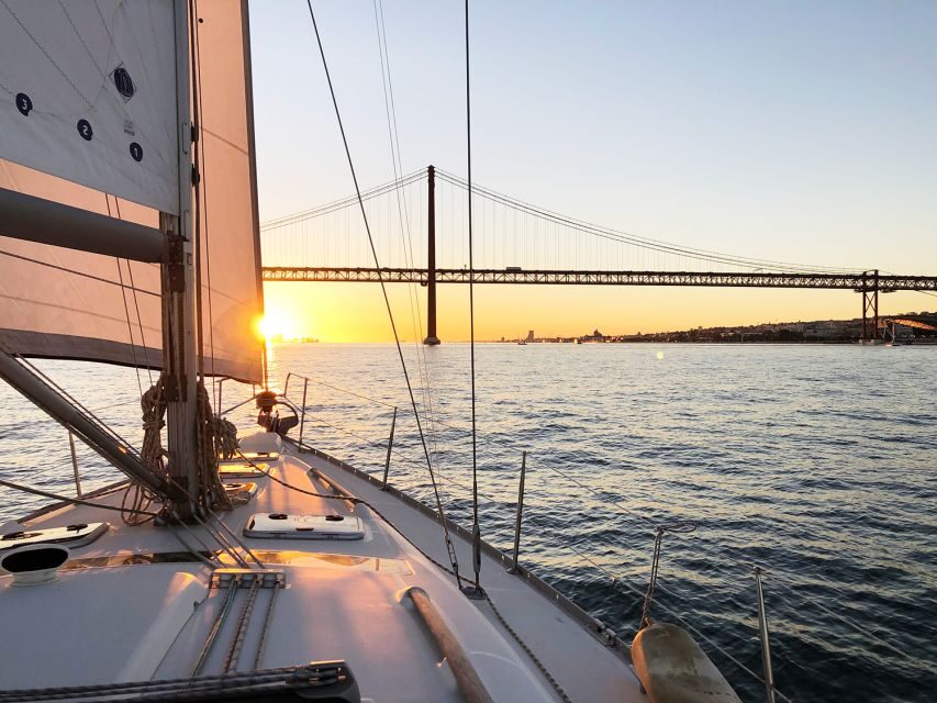 Lisbon: Tagus River Sunset Cruise with Drinks - Cacilhas and Christ the King: shifting perspective across the river