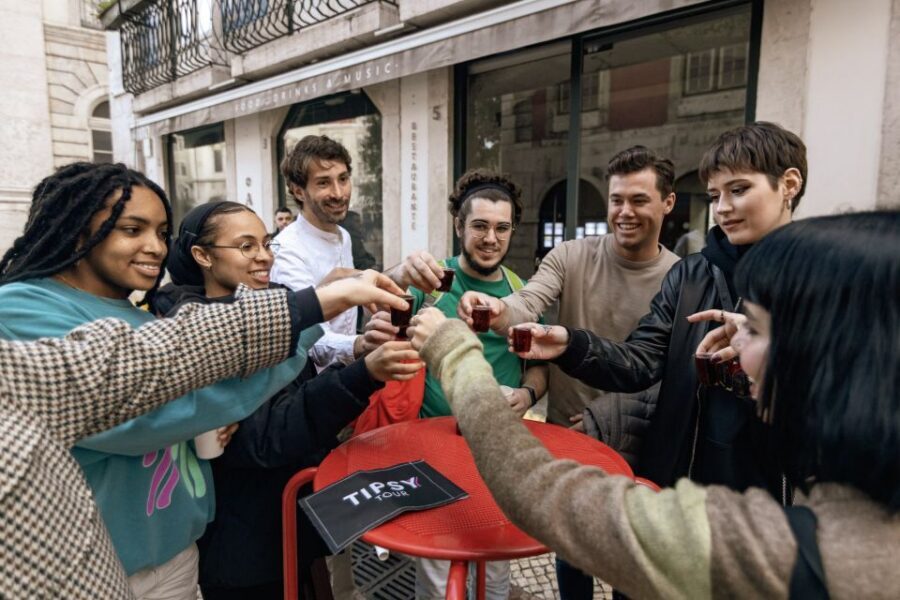 Lisbon: Tipsy Tour Fun Bar Crawl with a Local Guide - Bairro Alto bars with organised entry and real crowd energy