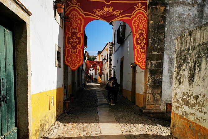 Lisbon to Porto Up To 5 Stops Óbidos Nazaré Fátima Coimbra Aveiro - Nazaré: ocean views, fishing village vibes, and surf history