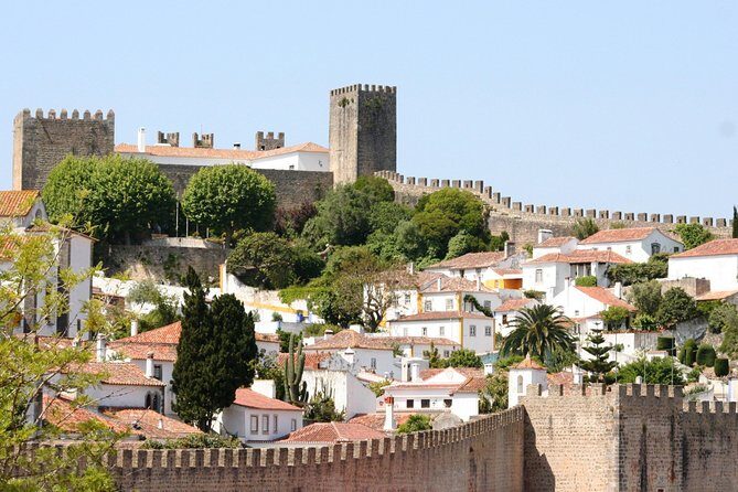 Lisbon to Porto Up To 5 Stops Óbidos Nazaré Fátima Coimbra Aveiro - Coimbra in 20 minutes: quick university viewpoint power