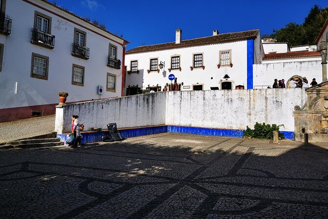 Lisbon to Porto Up To 5 Stops Óbidos Nazaré Fátima Coimbra Aveiro - Aveiro: canals, moliceiro boats, and ovos moles