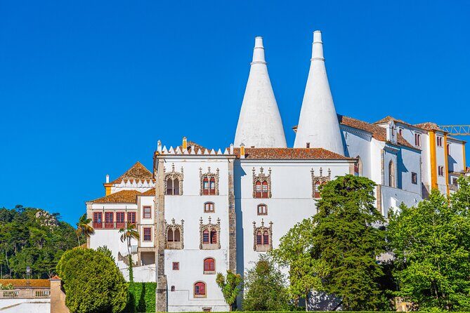 Lisbon to Sintra, Pena Palace, Regaleira & Cascais, small-group - Quinta da Regaleira: Caves, Coded Symbols, and a Well That Grabs Attention
