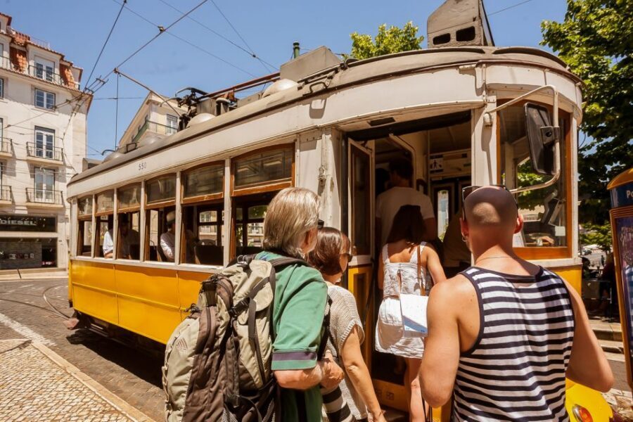 Lisbon Tram No. 28 Ride & Walking Tour - Riding Tram 28: the views, the pace, and the reality of public transport