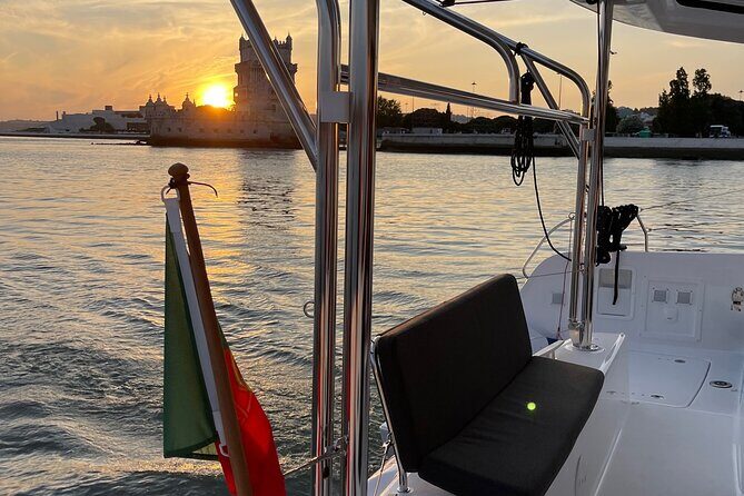 LUXURY Catamaran Sunset and Wine cruise - 25 de Abril Bridge, Time Out Market, and Praça do Comércio: The Night-On Reflection Zone