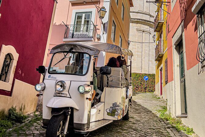 Private Half-Day Eco Tuk Tuk Tour in Lisbon - Chiado and the ruins of a 1389 monastery after 1755