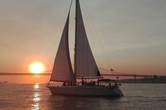 Sailboat Tour in Lisbon with drinks included | Morning and Sunset - Passing 25 de Abril Bridge, MAAT, and the Discoveries monument