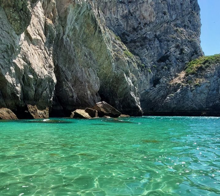 Sesimbra: Secret Bays and Beaches Boat Tour with Snorkeling - Stop 1: Praia da Cova for first photos and a snorkel-ready reset