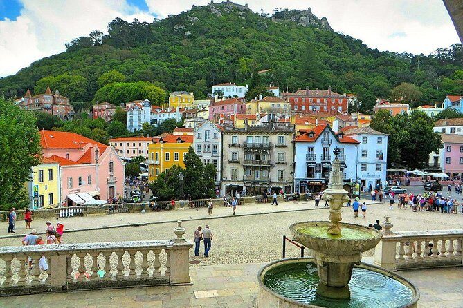 Sintra, Pena Palace, Cabo Roca, Cascais Small Group from Lisbon - Sintra old town break: medieval streets, tram/bus options, and quick resets