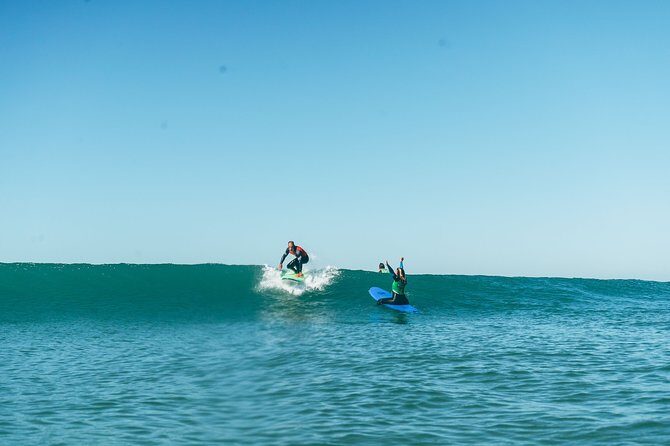 Surf Lesson in Lisbon - The surf experience - From Lisbon to Tarquinio: the 25 April Bridge pickup ride