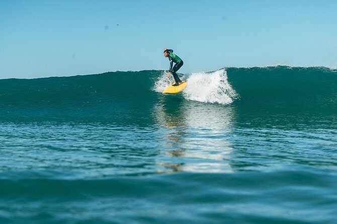 Surf Lesson in Lisbon - The surf experience - In the water with the coach: standing up, wave choice, and real feedback