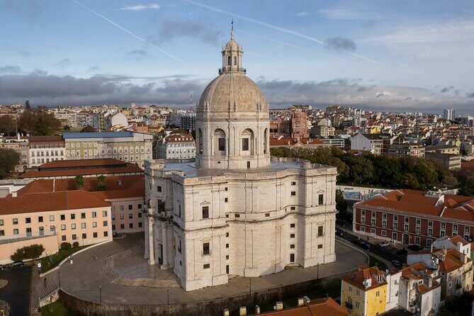 Tuk tuk experience through the historic neighborhood of Alfama - Portas do Sol Miradouro: The Tagus View That Helps You Orient